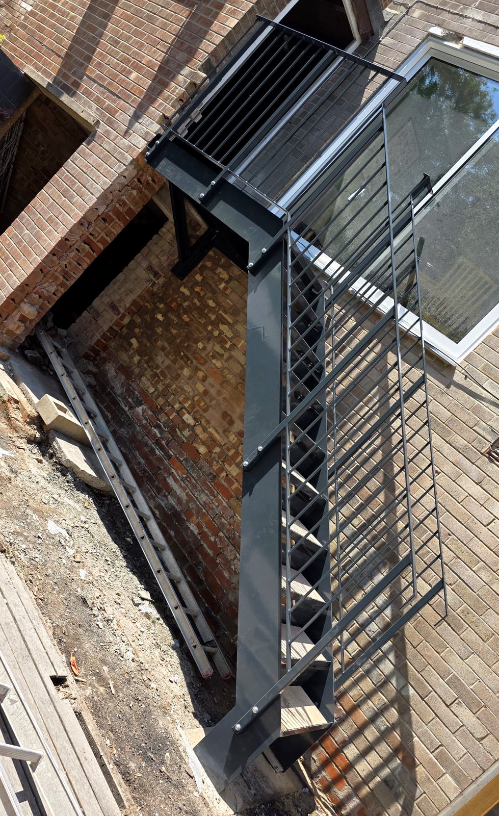 Bespoke external metal staircase with flights and a mid-landing, Meadowhead, Sheffield S8